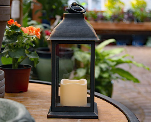 Illuminated Garden: Flameless Outdoor Antique Bronze Candle
