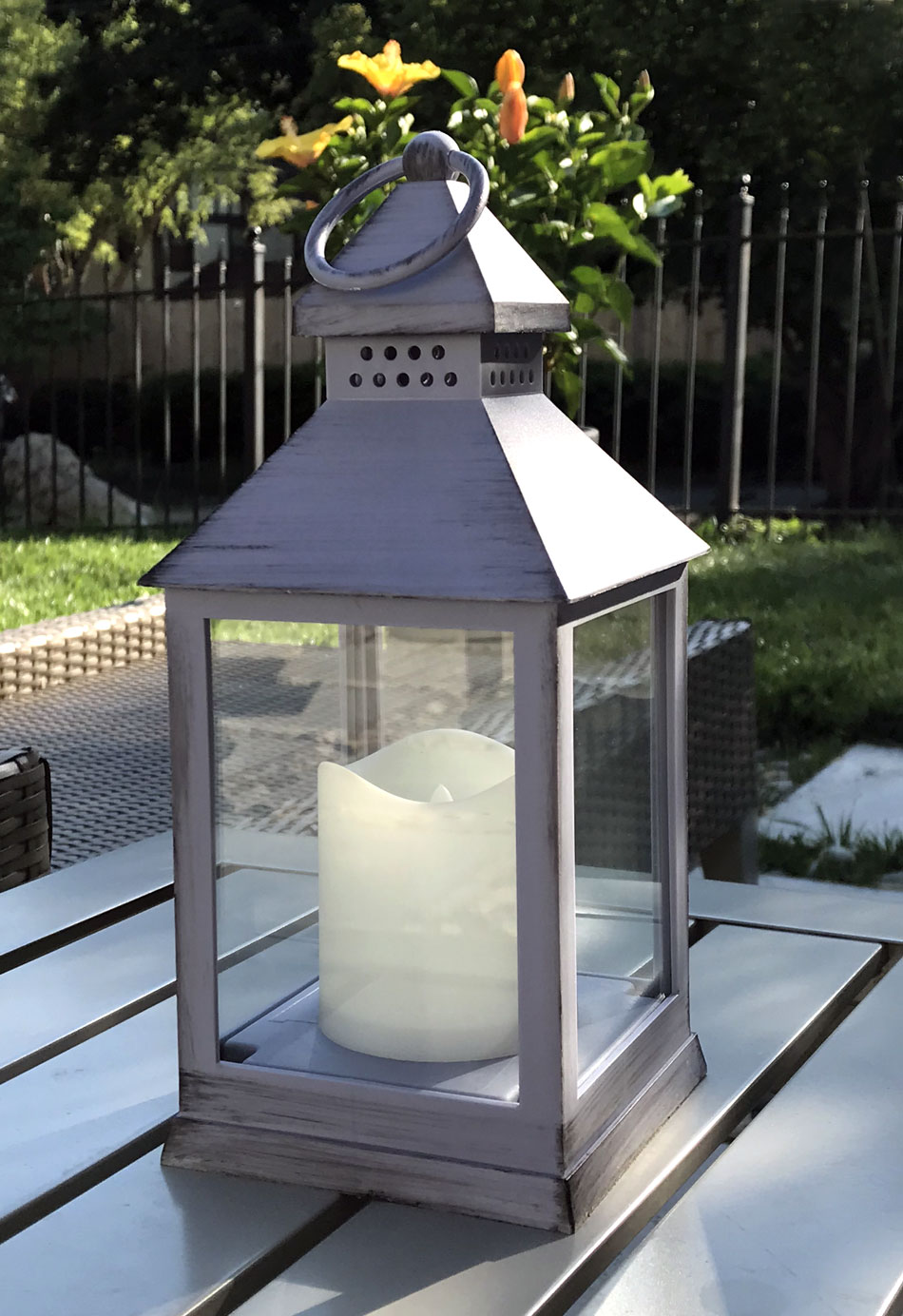 Illuminated Garden: Flameless Outdoor Purple Candle Lantern With Timer